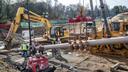 Pipefitters, left, work to connect a long segment of pipe that is being suspended in air to make it ready to be pulled undergroud in a residential area of West Chester, PA on Ship Road and South Pullman Drive as part of the Mariner East Pipeline that is going through the area on November 11, 2019.