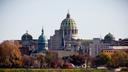 The Pennsylvania Capitol in Harrisburg is seen in fall.