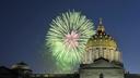 Fireworks explode over the Pennsylvania state Capitol building.