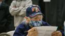 A voter studies a provisional ballot while filling it out in South Philadelphia on Election Night 2020. As of Thursday morning, roughly 27,500 had been processed and reported to the state, unofficial results show.