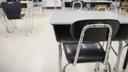 Desks inside a classroom.