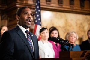 Micah Sims, executive director of Common Cause Pennsylvania, speaks at the Capitol during the signing of an election reform bill on Oct. 31, 2019. The group, which helped champion the state's 2006 lobbying law, was fined $19,900 for breaking it. Sims attributed the failure to technical difficulties.