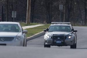 A police cruiser on the highway