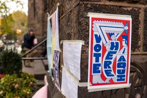 Voting signs in Philadelphia in 2021. In odd-year elections like these, many local candidates cross-file.