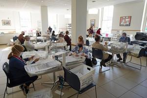 Mail ballots are sorted and counted by workers on Election Day at Northampton County Courthouse in Easton.