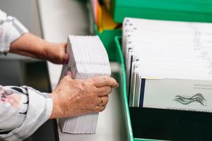 Mail-in ballots are sorted and counted at Lehigh County Government Center in Allentown. (Matt Smith / For Spotlight PA)