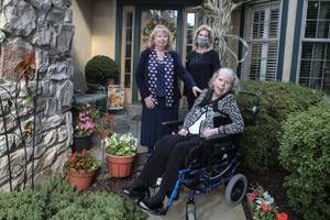 Christi Marshall, left with her sisters Karen Greene, center and sister Laura Hervey at Hershey's Mill in West Chester. Laura depends on her sisters in the event of a pipeline problem for her evacuation, Thursday, October 8, 2020