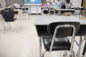 Desks inside a classroom.