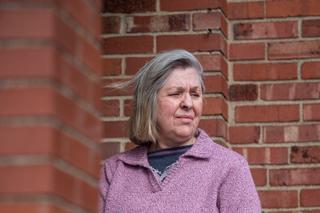 Sandy Kolenda outside her home in Munhall. She's among thousands of victims of identify fraud through Pennsylvania's unemployment system who was surprised with a tax bill for payments she did not receive.