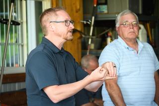 Kevin Hulburt, left, is worried about the effects that drinking PFAS-contaminated water could have on his children.