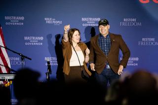 Doug Mastriano takes the stage with his wife Rebbie at his election night watch party in Camp Hill.