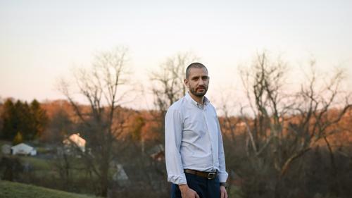 Ian Kalinowski stands for a portrait outside his Penn Township, Pennsylvania home on Wednesday, March 3, 2021. Ian’s brother, Adam Kalinowski, died by suicide in 2014 while a client at a treatment center run by Addiction Specialists, Inc., in Fayette County.